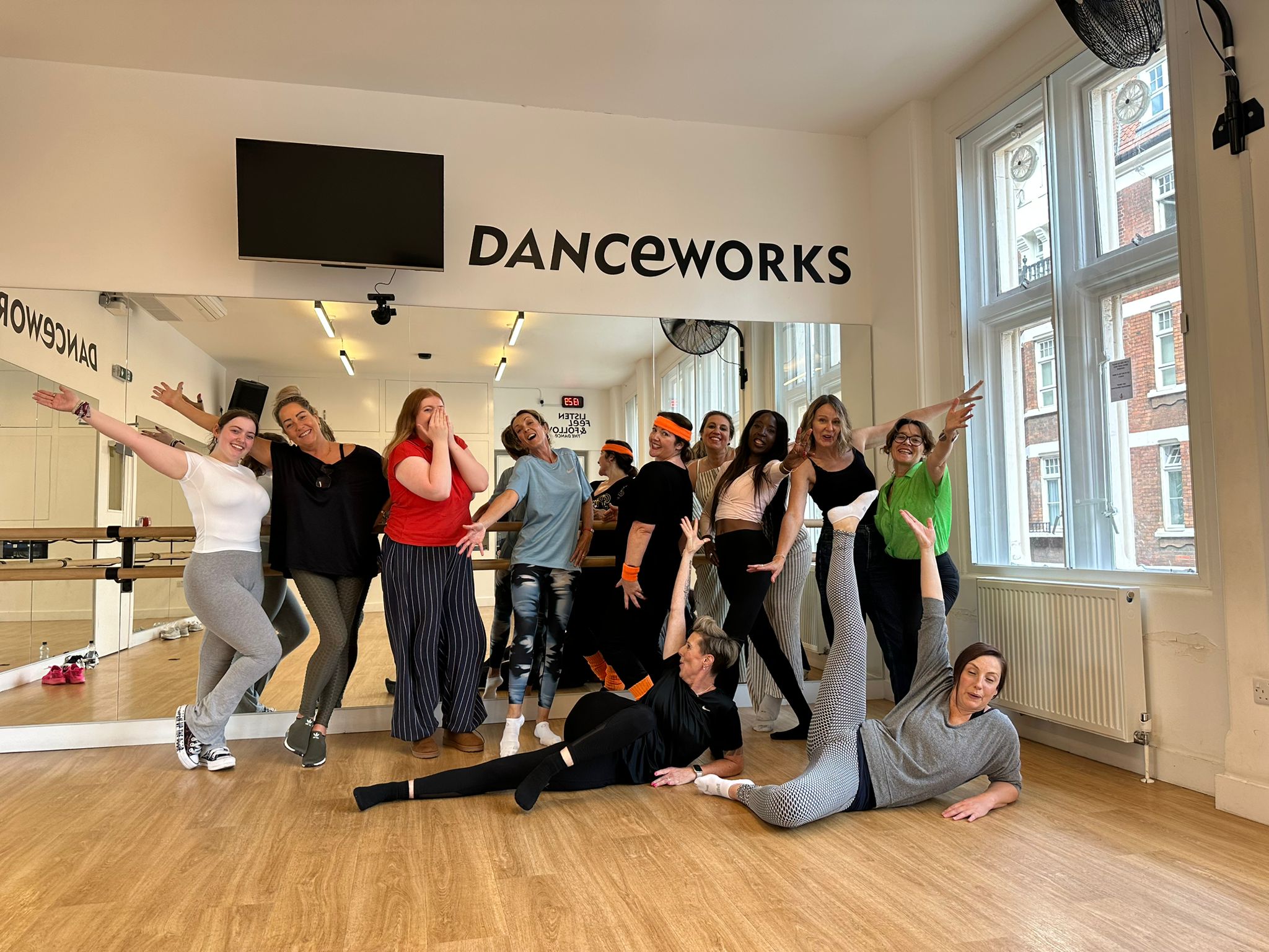 90s themed hen party Manchester - bride and hens in butterfly clips doing boy band formations