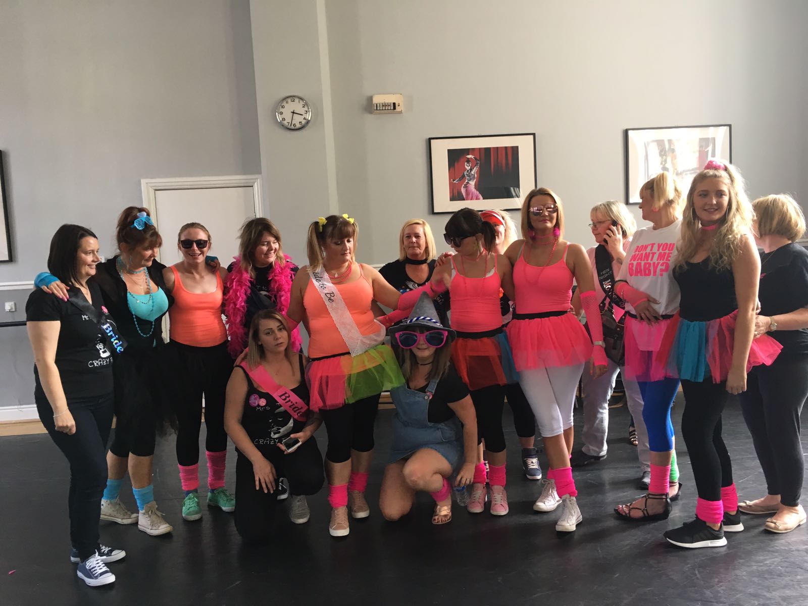 Wicked hen party dance class Manchester - group learning empowering musical theatre moves in theatrical outfits